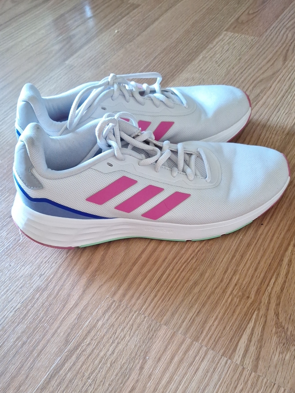 adidas Women's White Athletic Shoes with Pink Stripes and Blue Accents